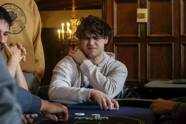 A member weighs his next move at the table